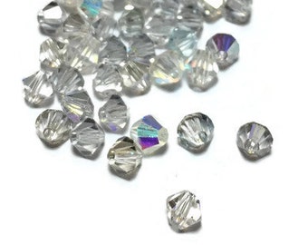 Biconos de cristal Swarovski AB - Cuentas de joyería de 4 mm, 12 unidades
