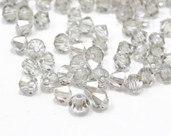 Bicones de cristal de Swarovski con pantalla plateada de cristal de 4 mm, 12 piezas