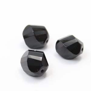 Große Schwarze Facettierte Twisted Nuggets 14 mm 4Stk