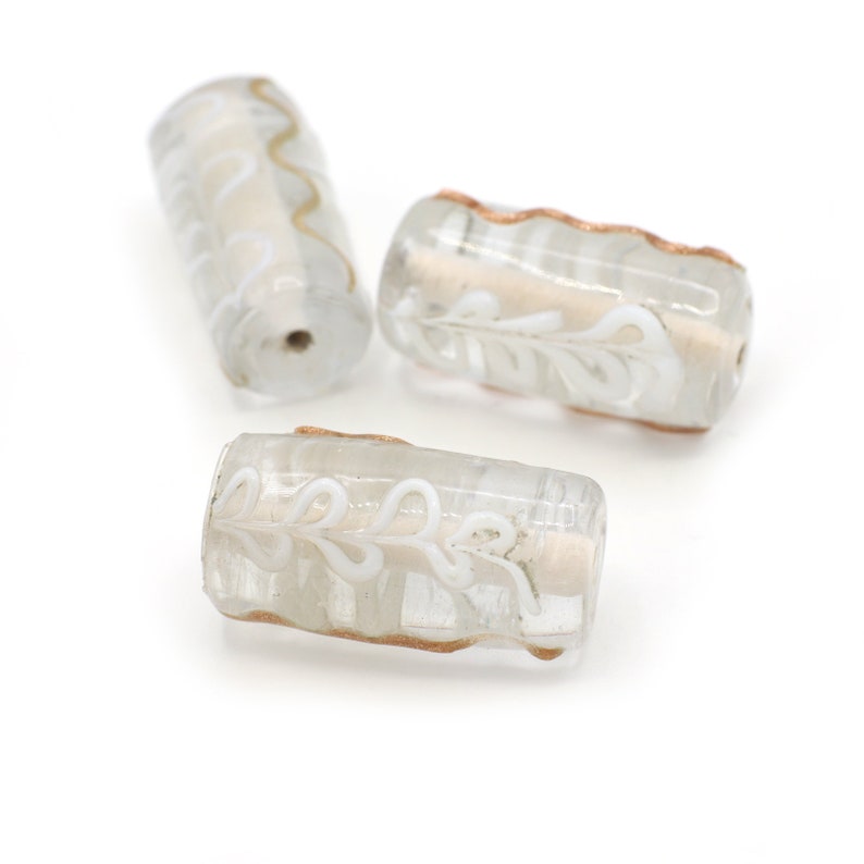 Clear Barrel Shaped Beads with Raised Squiggles and Flowers of White and Gold 20-25mm 2pcs