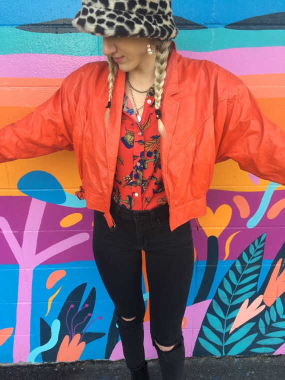 ORANGE crop leather jacket