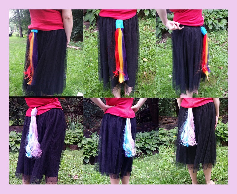 May include: A person wearing a black skirt with a colorful, rainbow-colored ponytail attached to the back. The ponytail is made of yarn and is about 18 inches long.