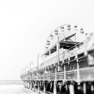 Set of 3 Santa Monica black and white photography prints showing the ferris wheel, palm trees and a lifeguard stand on the beach.