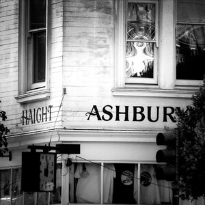 San Francisco photography print showing the Haight Ashbury district. Words are written on building at intersection.  Black and white version.