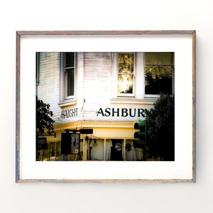 San Francisco photography print showing the Haight Ashbury district. Words are written on building at intersection.  Colors are white yellow and black.