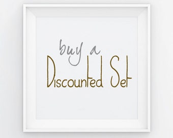 May include: White framed picture with the text "buy a discounted set" in brown and gray lettering.