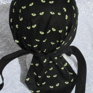 Halloween doo rag, skull cap with eyes, helmet liner with a cotton terry cloth sweatband.  Handmade.