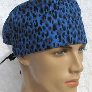 Blue animal print scrub cap, chemo hair loss hat chef hat with a cotton terry cloth sweatband.  Handmade in the USA.