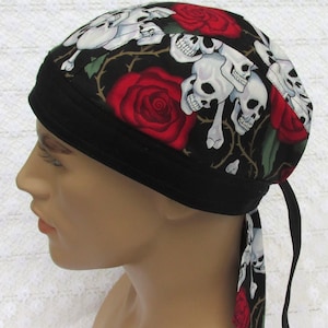 Skulls and roses skull cap, doo rag, chemo hair loss hat, bandana hat with a cotton terry cloth sweatband.  Handmade in America.
