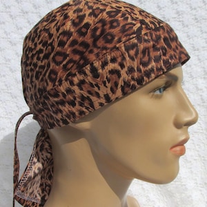 Handmade leopard print skull cap cancer hair loss bandana hat with sweatband.