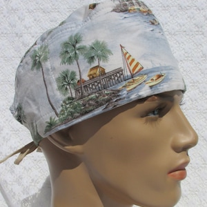 Palm tree Island Tiki scrub cap, chemo hair loss hat with a terry cloth sweatband.   Upcycled clothing handmade in the USA.