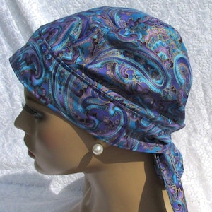 Women&#39;s blue paisley chemo hat, cancer hat, scrub hat, chemo headwear, with a cotton terry cloth sweatband.  Handmade in the USA.