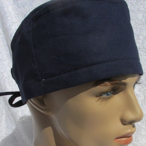 Navy blue scrub hat, chemo hat, cancer hat with a terry cloth cotton sweat band.  Hand made in the USA.