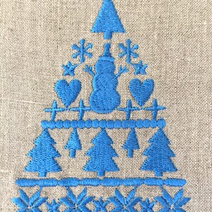 May include: Blue embroidered Christmas tree design on a beige linen fabric. The design features a snowman, snowflakes, hearts, and pine trees.