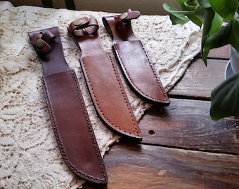 Fixed Blade Leather Sheath, Fits Clip Point Blades up to 7" in length, & 1 1/4 " Wide... Brown Leather Sheath, Strap with Snap