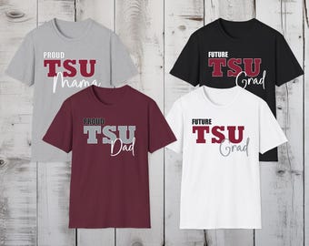 May include: Four short-sleeved t-shirts in gray, maroon, black, and white. Each shirt features the text "PROUD TSU Mama", "PROUD TSU Dad", "FUTURE TSU Grad", and "FUTURE TSU Grad" in a combination of red, gray, and white lettering.
