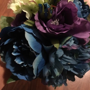 disney wedding bouquet made of fake flowers and hidden mickeys