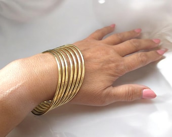 Set of 7 - 18k gold plated stainless steel round plain bangles,  inner diameter 65 & 68mm - large bangles fitting larger sized hands