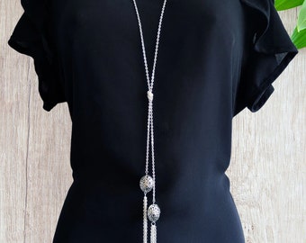 34" long silver tone knotted lariat style necklace with tibetan silver beads & chain tassel detail