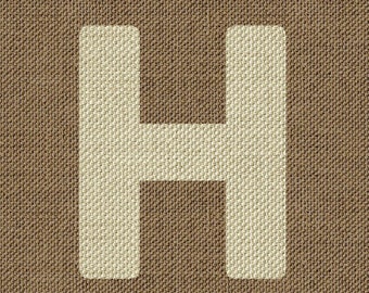 May include: A banner with a brown textured background and a large, off-white letter "H" in the center. The banner has a triangular bottom edge, suitable for hanging as a decoration.