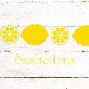 May include: A white wood background with four yellow lemons, two whole and two sliced. The text "freshcitrus" is written in yellow letters below the lemons.
