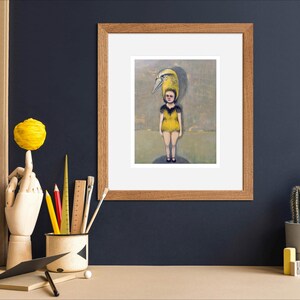 May include: A framed painting of a young person wearing a yellow and black costume with a bird's head. The person is standing on a circular platform in a field.