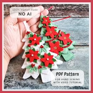 May include: Two felt Christmas tree ornaments, one white and one light green, decorated with red poinsettia flowers, green leaves, and small red and white beads. Text on image: 100% Human made NO AI and PDF Pattern FOR HAND SEWING WITH VIDEO TUTORIAL.