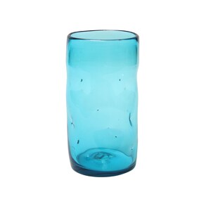 May include: A tall, light blue glass with a textured surface. The glass is empty and has a rounded bottom.