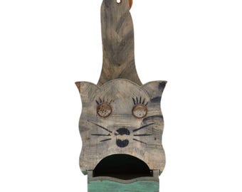 Portacerillas de color verde menta con forma de gato tallado con arte popular antiguo