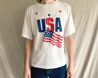アメリカ国旗のグラフィックTシャツが付いたUSAヴィンテージホワイトTシャツ