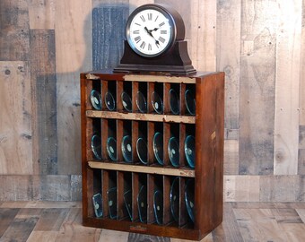 Vintage C & E Marshall Co. Clock Glass Cabinet with 25 individual glass slots, 28 different sizes of glass crystal clock faces and 40 total