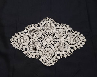 Crocheted vintage style oval pineapple doily