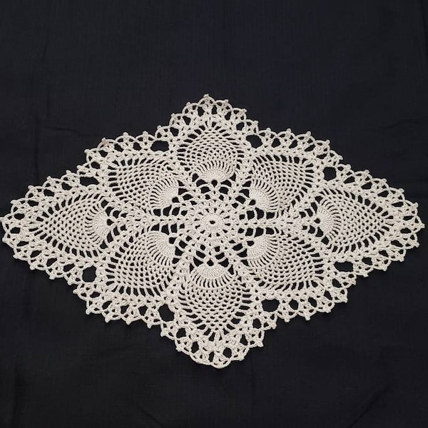 Crocheted vintage style oval pineapple doily