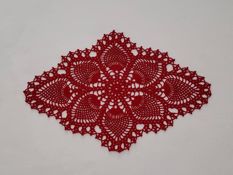 Crocheted vintage style oval pineapple doily Red
