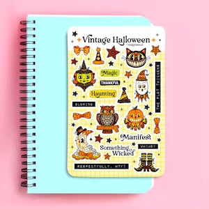 May include: A sticker sheet titled Vintage Halloween by magpiesoul featuring orange, yellow, and black illustrations of a cat, owl, pumpkin, moon, and stars. Text includes Magic, Thankful, Haunting, Glowing, Manifest, Something Wicked, The Plot Thickens, Whimsy, and Respectfully, WTF?.