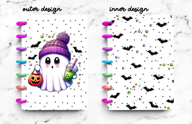 May include: Halloween-themed planner with a cute ghost character wearing a purple hat, holding a pumpkin bucket and a boba drink. The inner design features black bats on a white background. The planner has colorful binding rings.