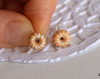 Straight post earrings in the shape of a French honey fruit bat or tractor wheel donut, sweet miniature food jewelry