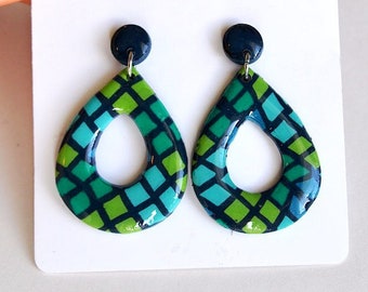 Modern style dangling earrings with exclusive design, geometric blue and green checkered patterns, original fashion accessory