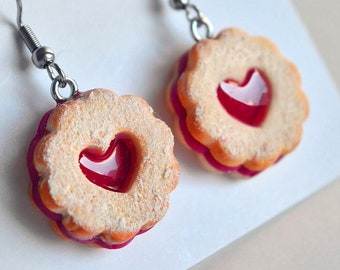 Delicious earrings shaped like miniature handmade Linzer cookies made of polymer clay, a unique and original gift idea