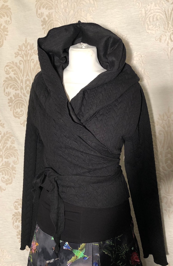 Black wrap cardigan with hoodie.