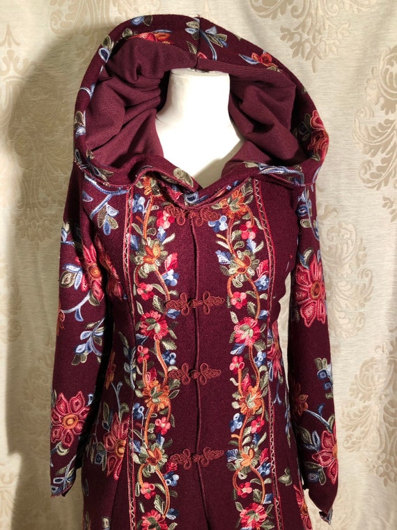 Burgundy wool coat.