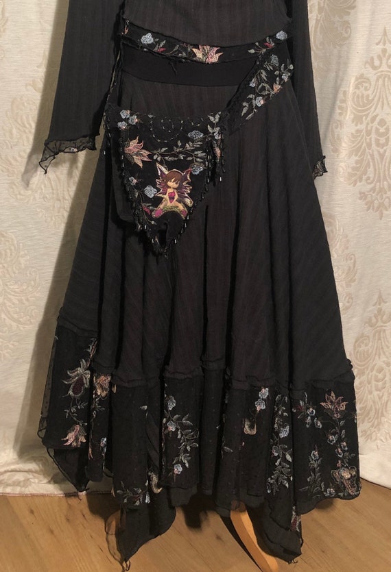 Black skirt with lace and matching hangemaakt bag with little Elf on it.
