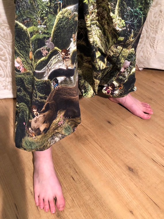 Harem pants with fantasy print of bears and elves in the green forest