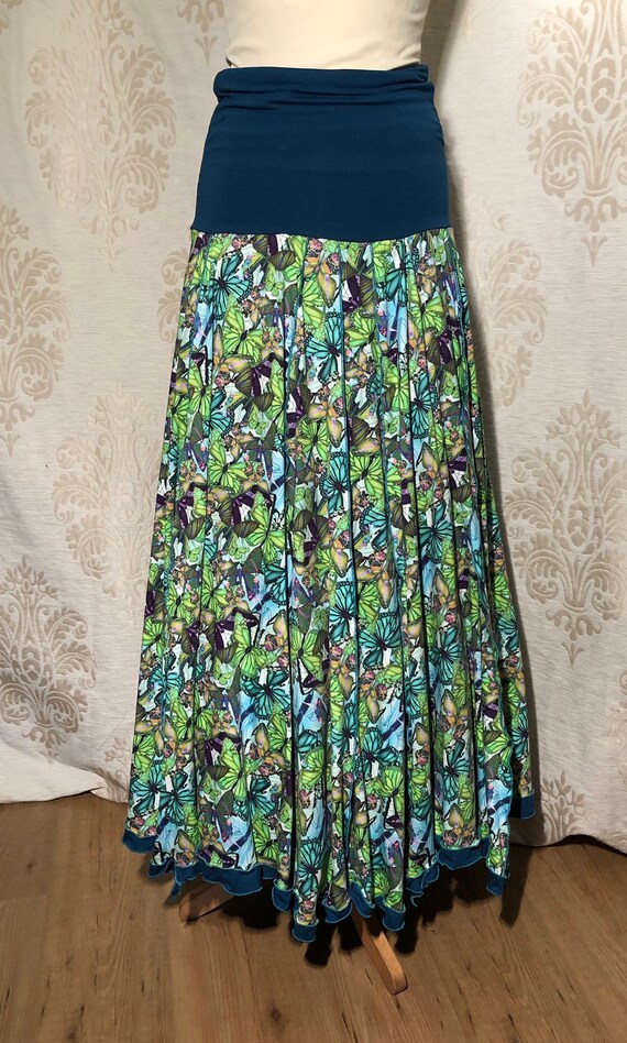 Green skirt with flowers and butterflies. Digital Print