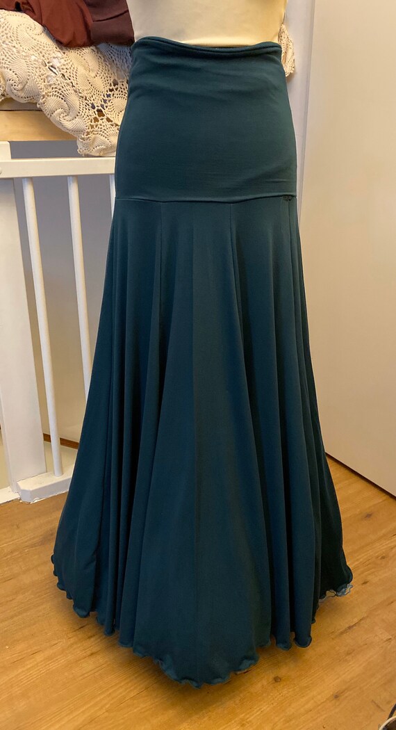 Beautiful smooth ly falling long skirt. Dark green.