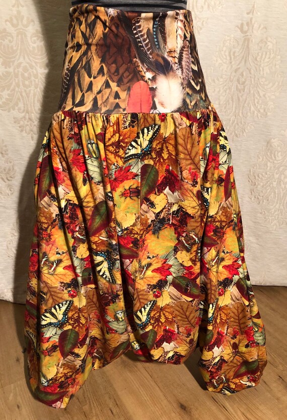 Harem pants with fantasy print with butterflies and lieveheerstbeestjes.