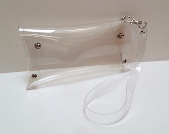 Funda tipo billetera para iPhone de vinilo transparente hecha a mano con correa para la muñeca