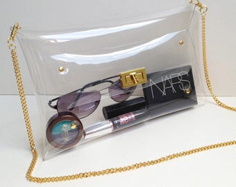 Clutch de vinilo transparente: Monedero transparente con cadena dorada