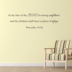 May include: A wall with a light yellow background and a black text quote from Proverbs 14:26, "In the fear of the LORD is strong confidence: and his children shall have a place of refuge."  A striped armchair and a side table with a potted plant are in the foreground.