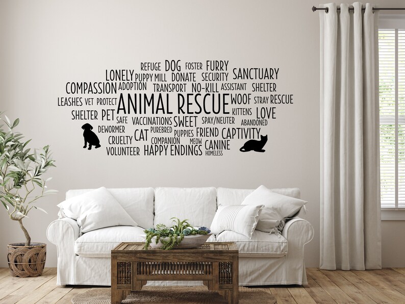 Peut inclure: Texte noir et blanc sur un mur blanc avec les mots "Animal Rescue" en grandes lettres. Le texte est entour&eacute; d'autres mots li&eacute;s au sauvetage des animaux, tels que "refuge", "compassion", "amour", "errant", "ami", "canin", "f&eacute;lin", "b&eacute;n&eacute;vole", "heureux d&eacute;nouement" et "sans abri".
